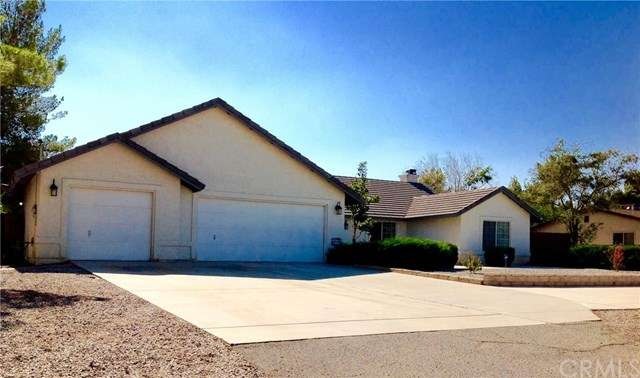 GORGEOUS HOME WITH OVERSIZE 3 CAR GARAGE AND BEAUT