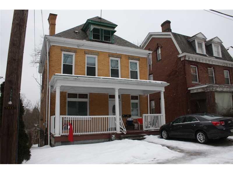 Exterior Front. All brick duplex with off street p