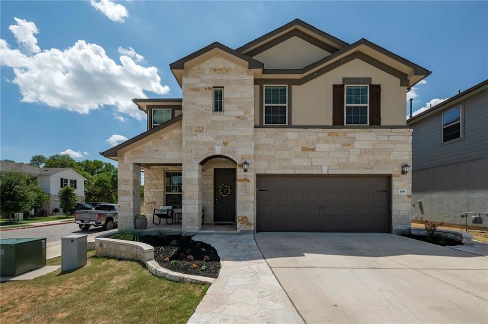 View of front of house featuring stone siding, co