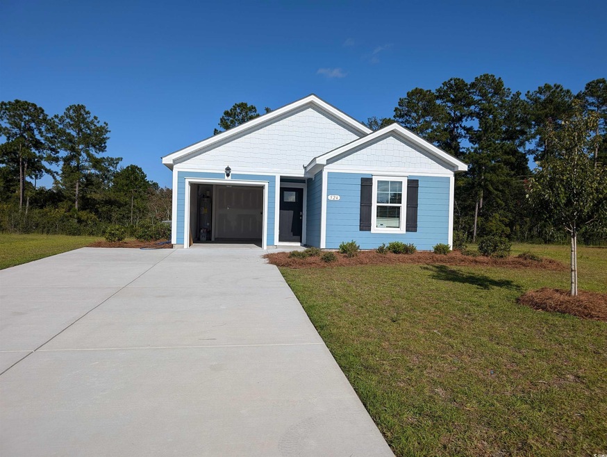 View of front facade with a front yard