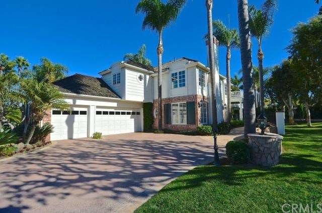 Palm studded drive and green space galore create t