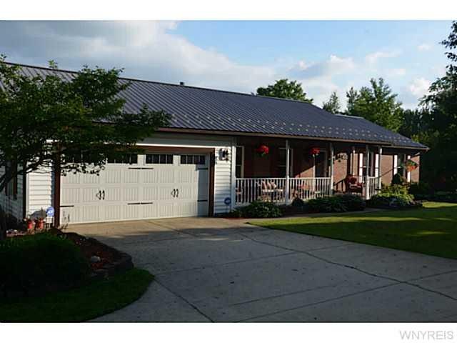Exterior Front. Stunning brick and vinyl 3 bedroom