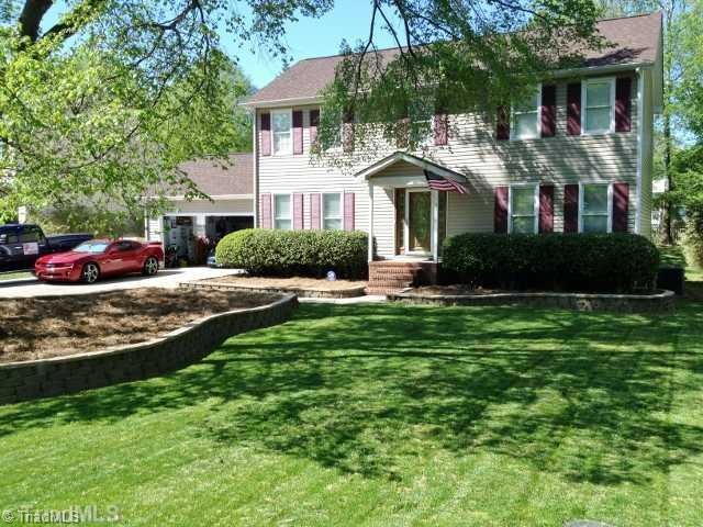 Exterior Front. The interior upgrades in this home will AMAZE you, but the exterior is also AMAZING! The home sits on a nicely landscaped large lot with mature trees and shrubs. The roof is only 7 years old, the siding 5 years, and the HVAC was replaced in 2014.