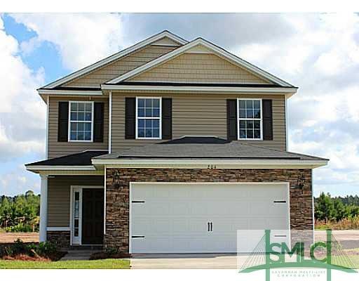 Exterior Front. The Daufuski plan by Ernest Homes.