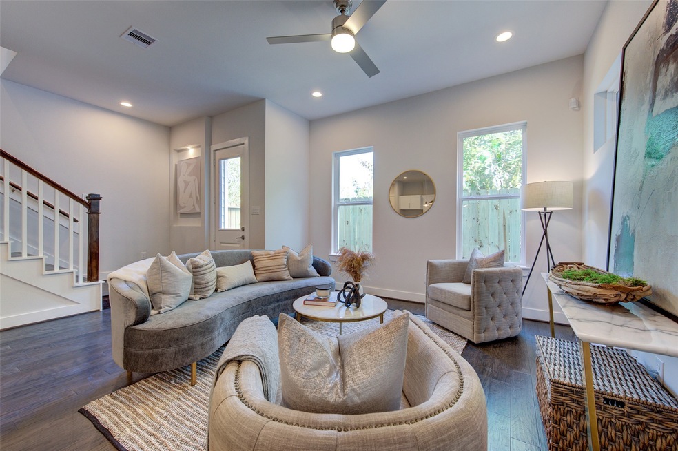 Welcome to a spacious living room featuring high c
