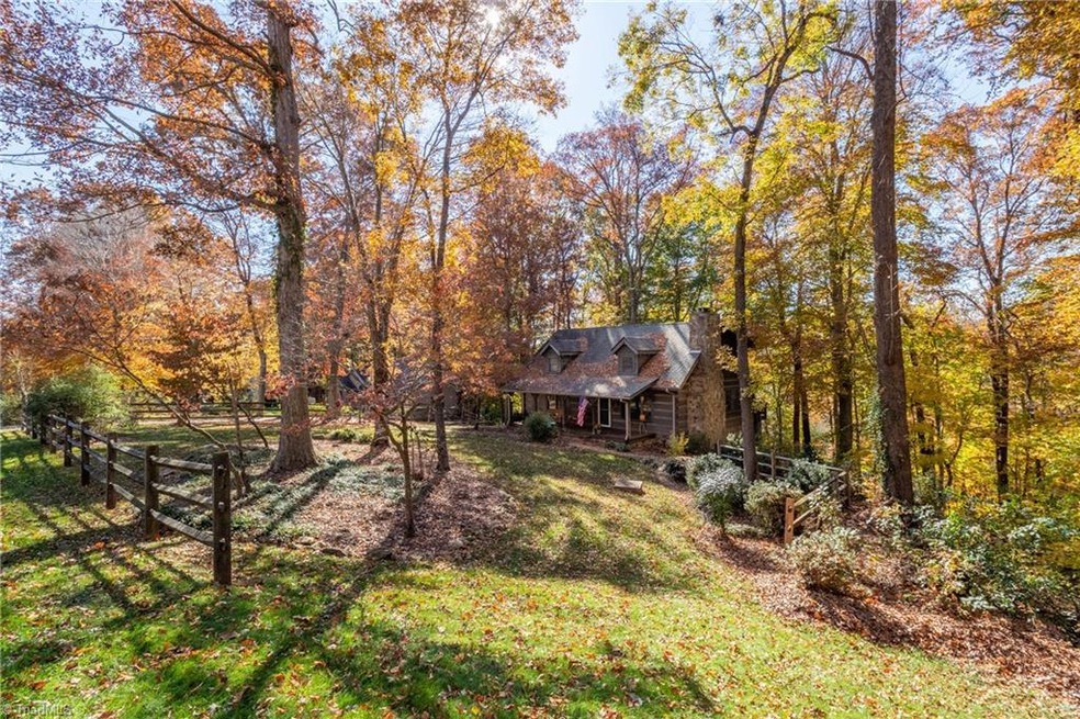 GLORIOUS 1.91 acres boasting log cabin nestled in the woods