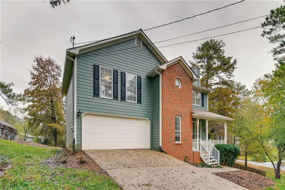 4322 Deer Ridge Ct SW, Lilburn, GA 30047 - photo 1