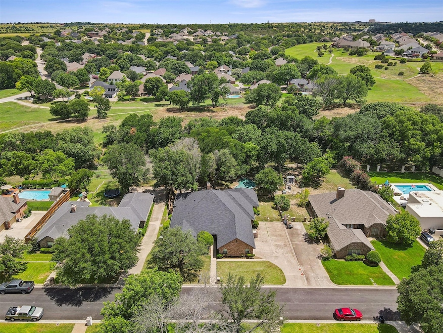 Serene, treed, creek side, half-acre lot in the Be