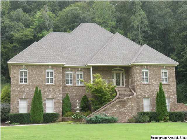 Low-maintenance brick home on 3.58 +/- acres has m