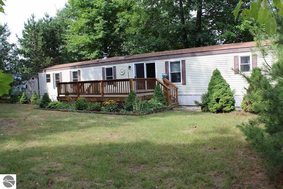 5786 Prescott Dr, Tawas City, MI 48763 - photo 1