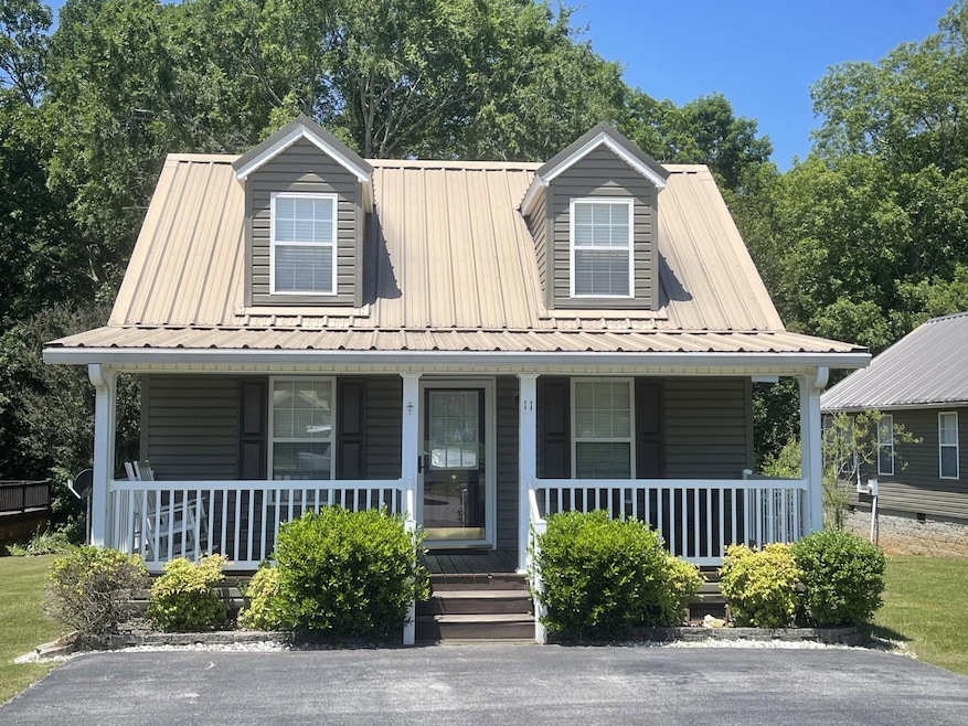 View of front of house featuring covered porch