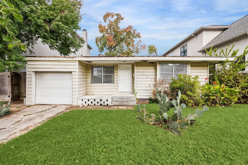 The property is a single-story home with beige sid