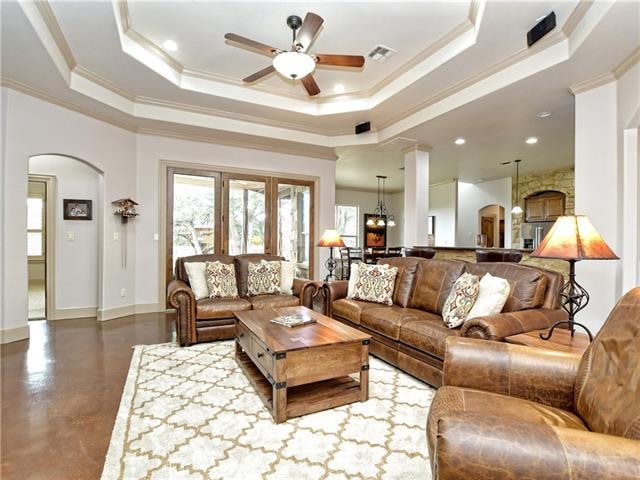 Beautiful coffered ceilings, recessed lighting and lots of natural lighting make this open family room bright and airy!