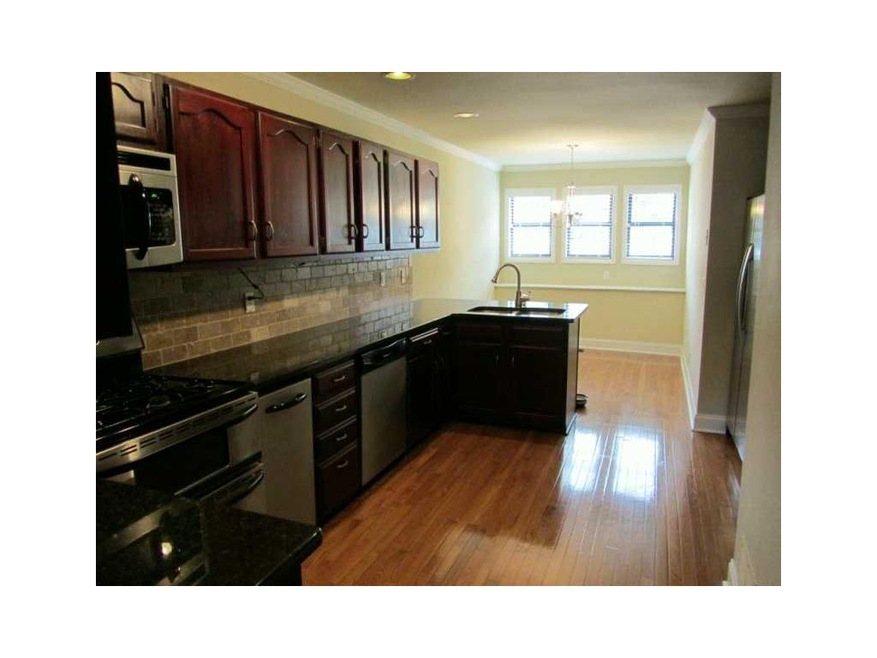 Exterior Front. Custom kitchen features refinished