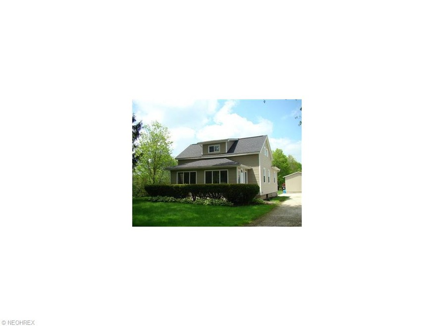 1.1 acres . Enclosed front porch with heat , tongu