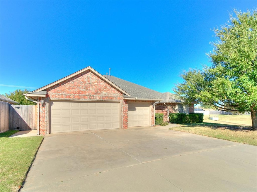 Ranch-style house featuring brick siding, concrete driveway, a garage, and a shingled roof