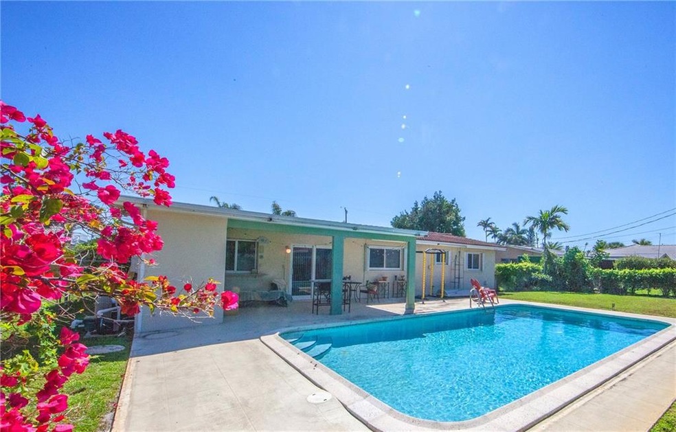 Large fenced back yard with a over sized pool. Not