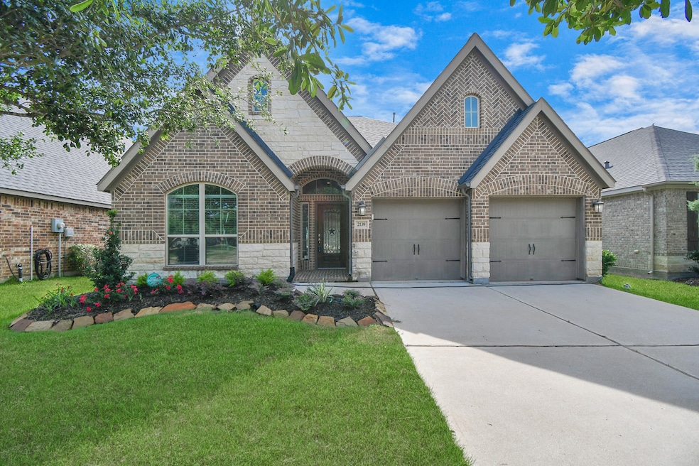 Welcome to your dream home at 2139 Blossomcrown Drive! This stunning 4-bedroom, 2.5-bathroom 2,308SF charming brick and stone home located in the highly desirable Firethorn West is ready to be yours!