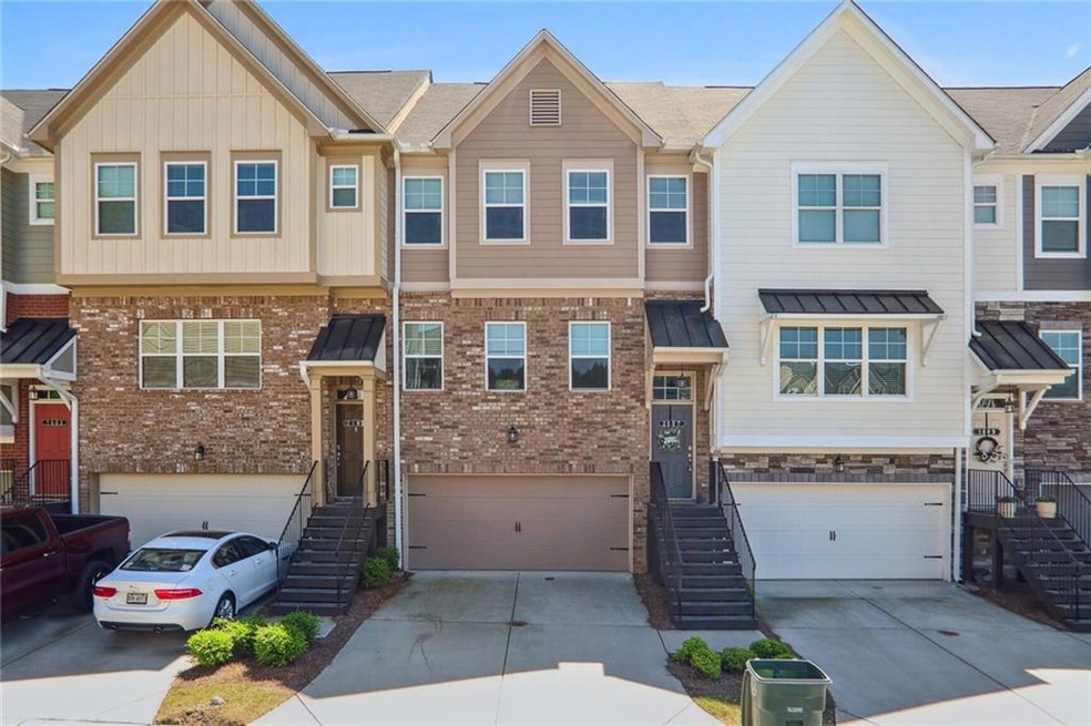 Townhome / multi-family property with a garage