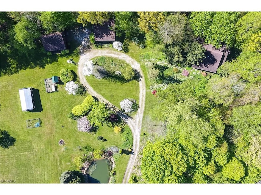 An aerial view of the circular drive leads to the 