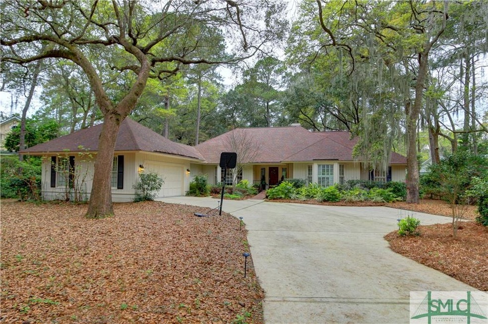 Large shady lot nestled under live oak trees.