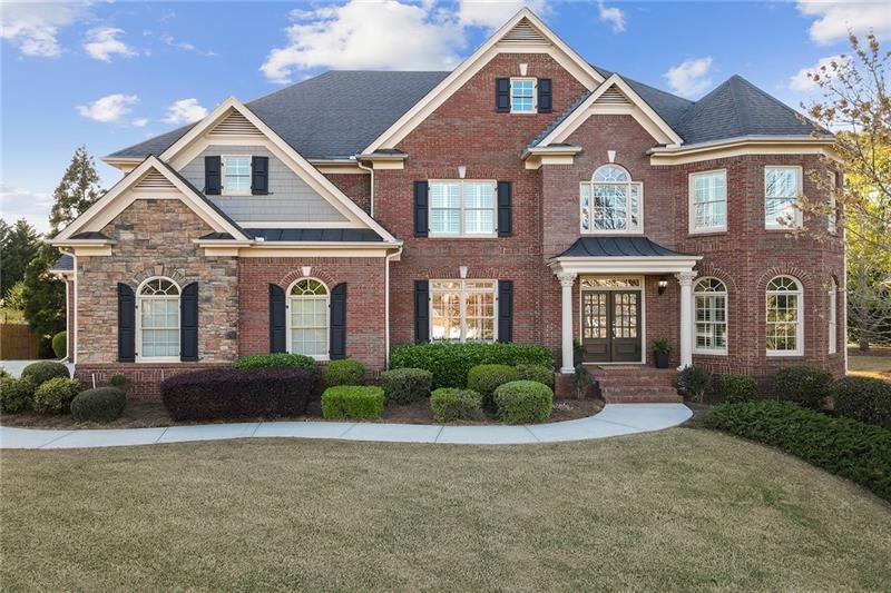 Beautiful Executive Four sided brick home near Ros