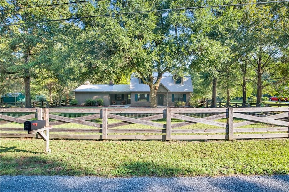 View of home's community featuring a lawn