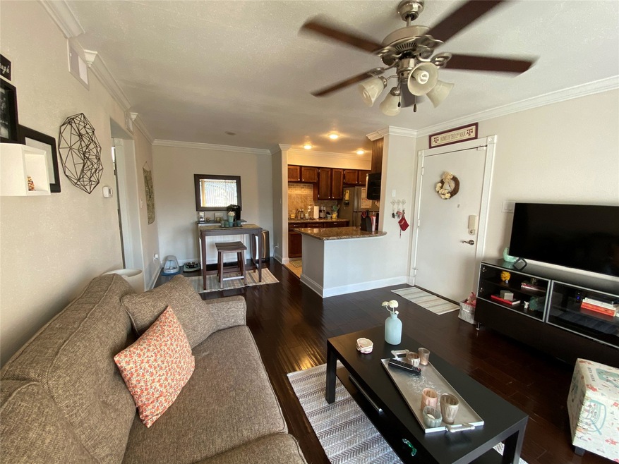 Looking from balcony into living and dining