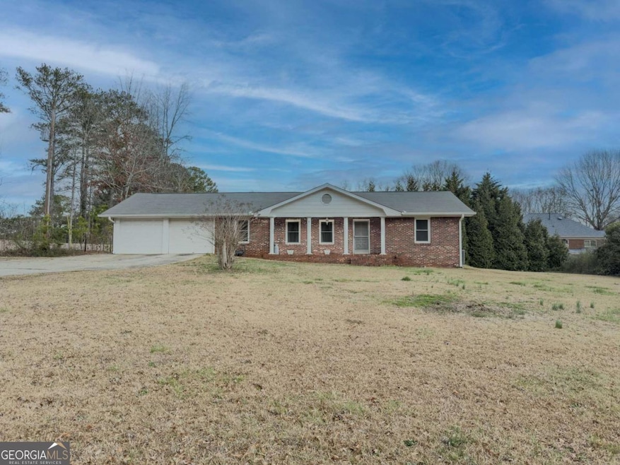 772 Garner Rd SW, Lilburn, GA 30047 - photo 1