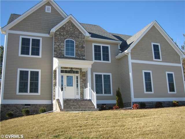 Exterior Front - Home being built will have similar features.