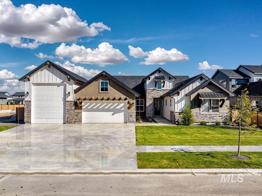 Modern inspired farmhouse with stone siding, a front lawn, concrete driveway, an attached garage, and board and batten siding