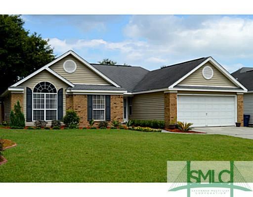 Exterior Front. Professionally landscaped, immacul