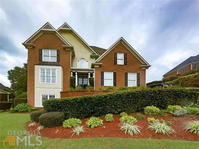 Stately Brick Home in Exclusive Bridgemill Neighbo