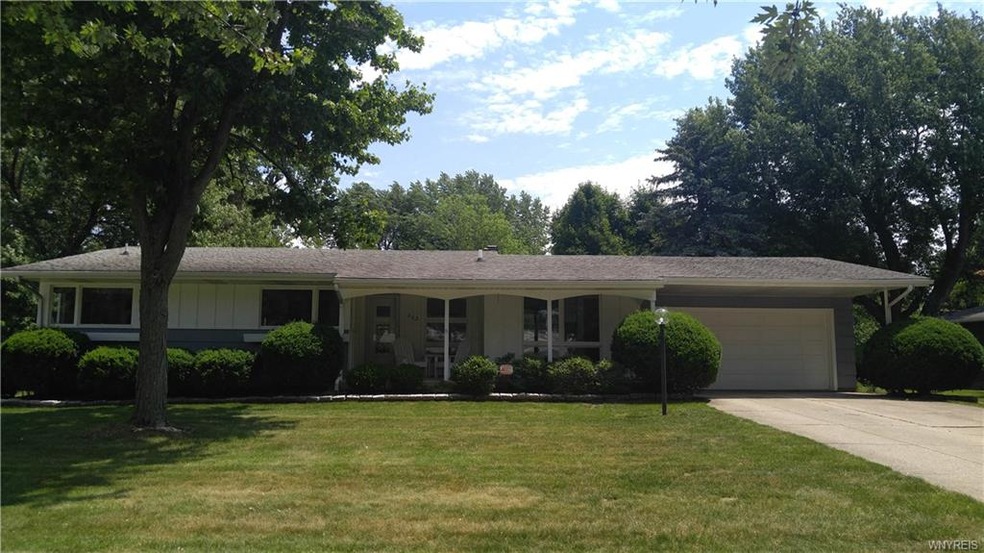 This sprawling, ranch style home is situated on qu