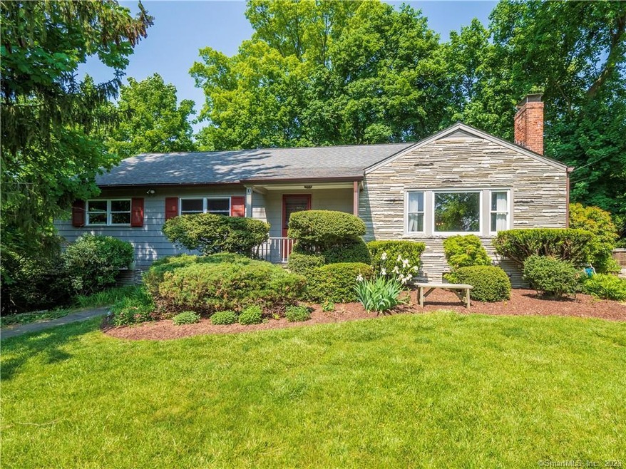 Attractive ranch in a private setting with establi