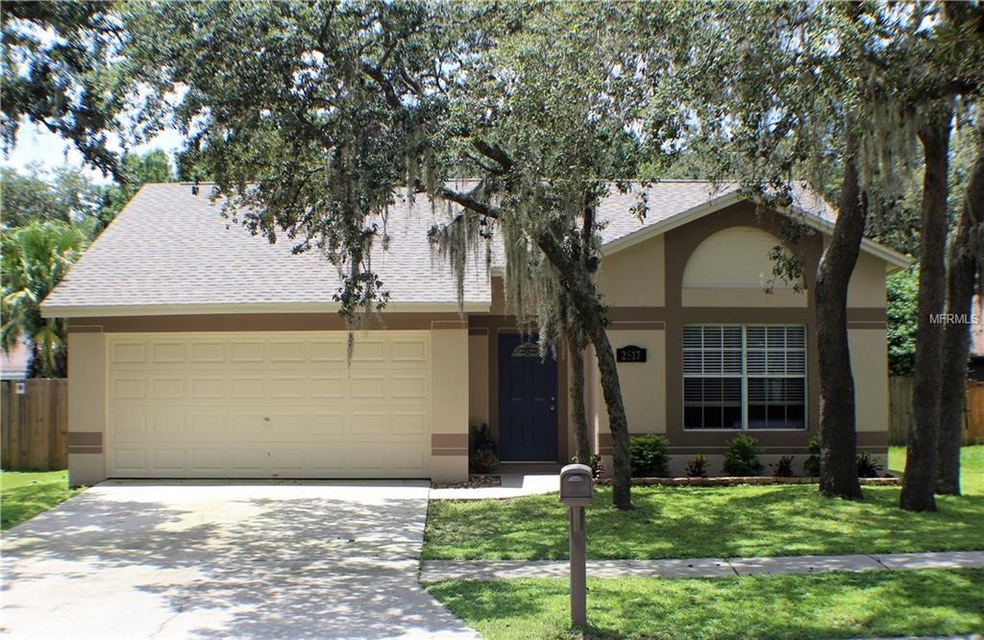 Front of Home - Beautiful mature landscaping and t