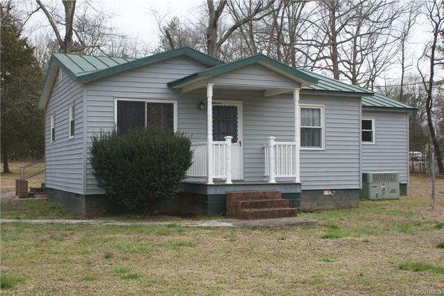 Front of house with covered porch
