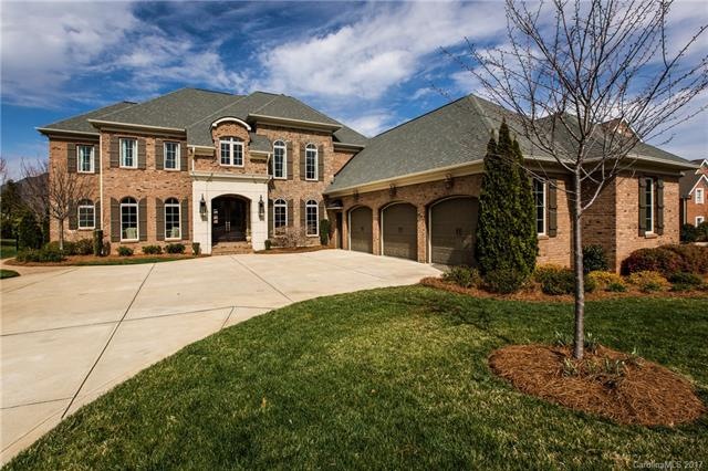 Stately brick home with 3-3/4 garage in this quiet