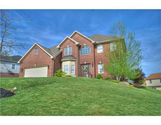 Exterior Front. Amazing custom home located in Eas