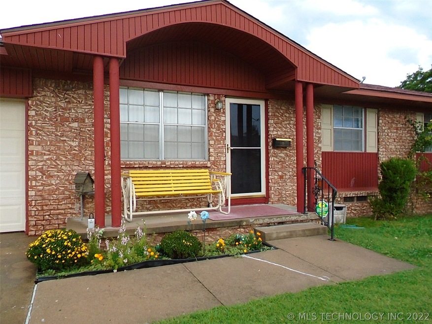Cute as can be front porch, full brick home