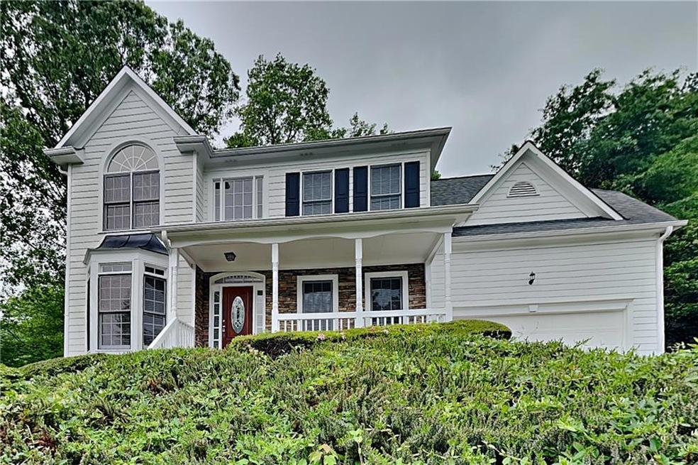 Traditional home featuring a porch