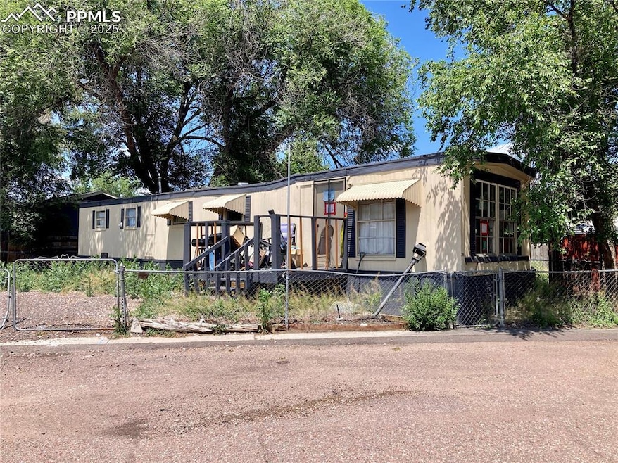 Single wide mobile home. Land conveys with the sale.  No HOA or lot rent.