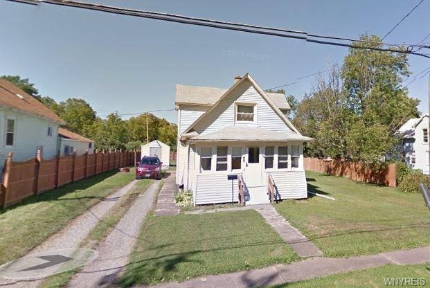Exterior Front with relaxing front porch.