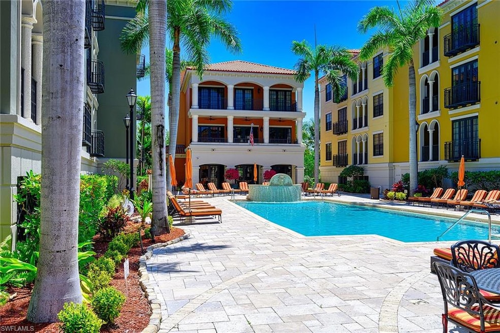 Community pool featuring a patio area