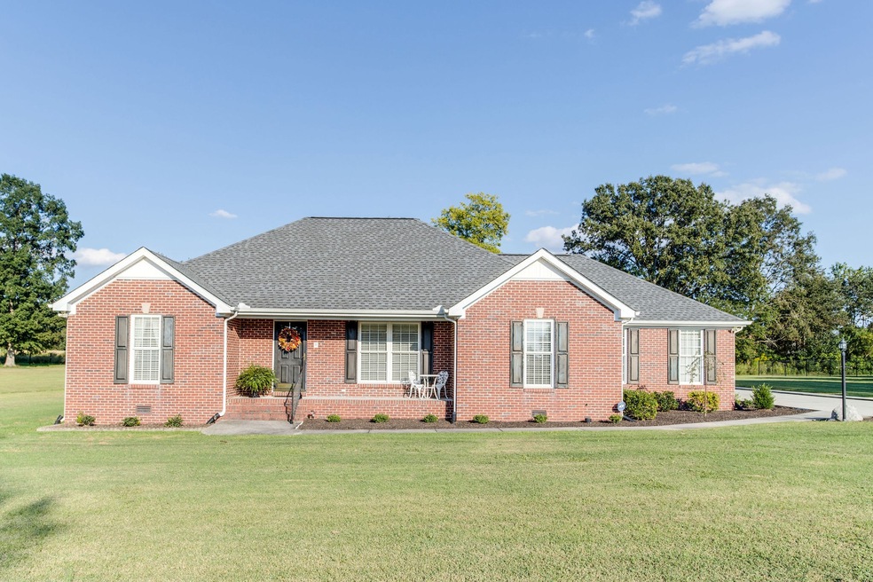 Beautiful 3 BR/2.5 bath brick home with detached garage & 1.29 acres in Amberwood Estates!  Situated in a peaceful & family-friendly neighborhood.
