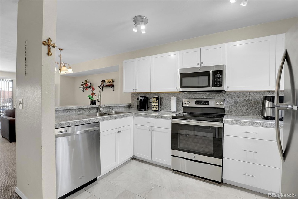 3556 S Depew St unit 12, Denver, CO 80235 - photo 1