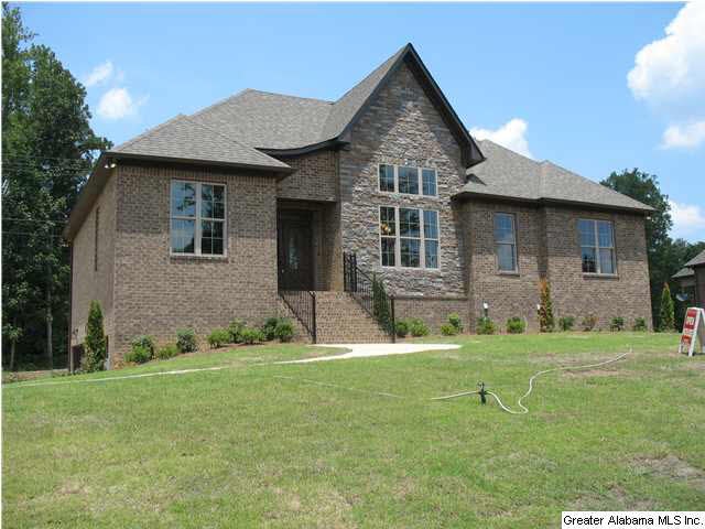 Wonderful corner lot stacked stone on front plus d