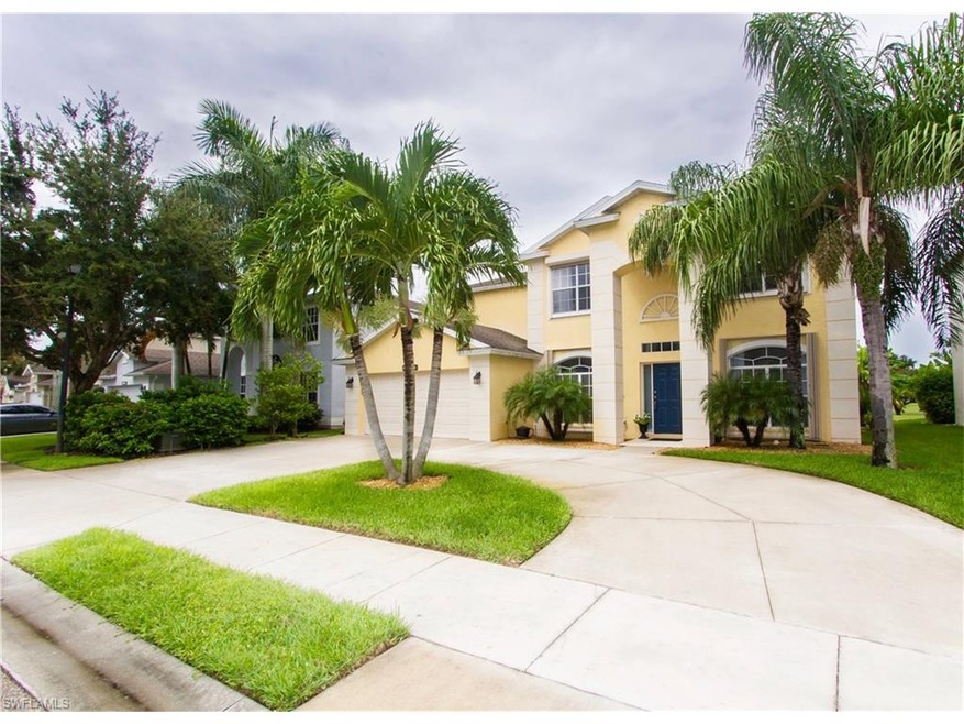 Front Exterior with circular driveway and 2 car ga