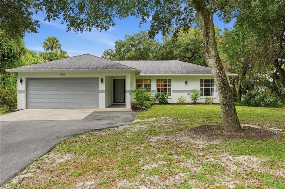 1094 13th St SW, Naples, FL 34117 - photo 1