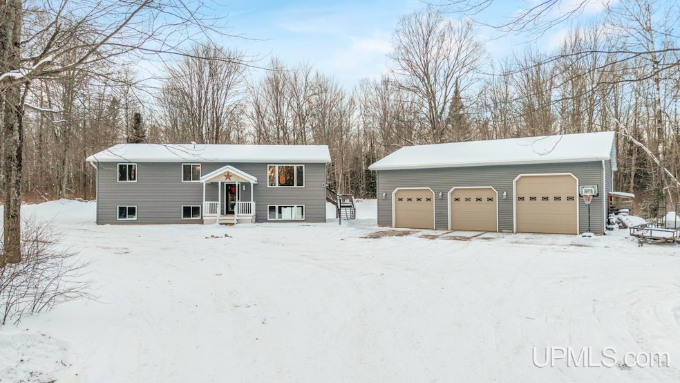 W8500 M69 Hwy, Iron Mountain, MI 49801 - photo 1